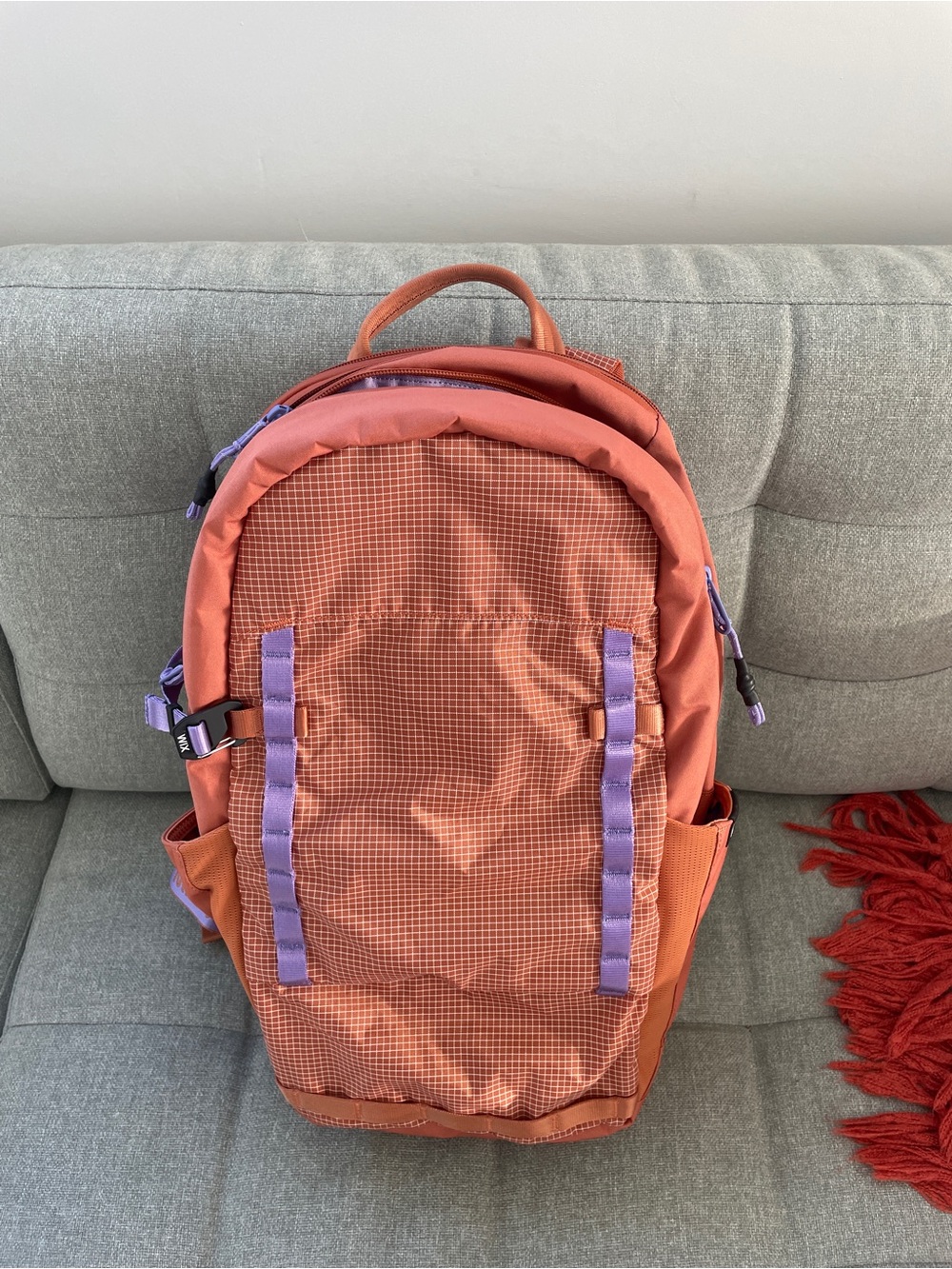 Orange Boundary Supply Backpack with purple Trim